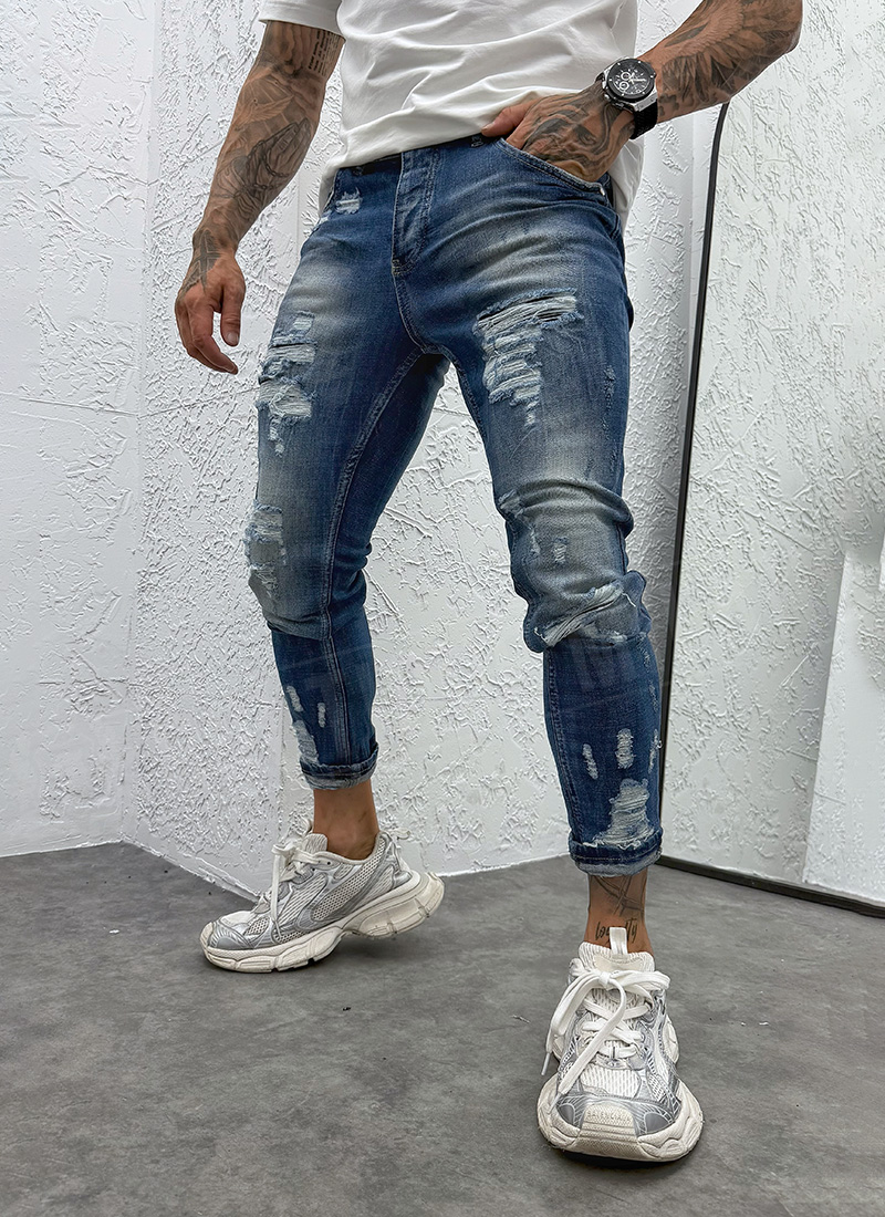 Ανδρικό σκούρο μπλε τζιν σε γραμμή slim-fit με εφέ σκισίματος A4924